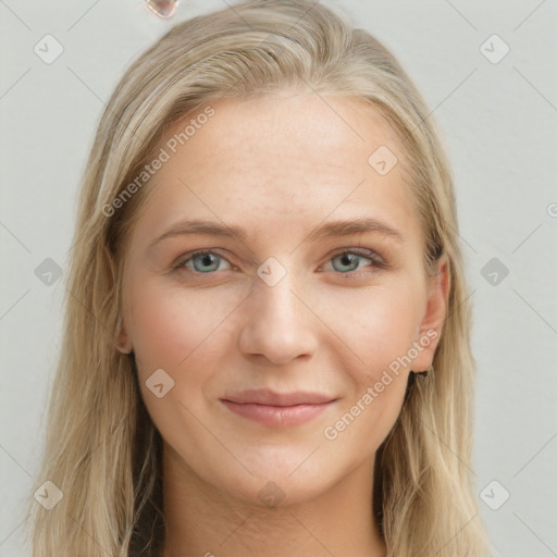 Joyful white young-adult female with long  brown hair and blue eyes