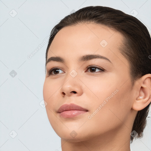 Neutral white young-adult female with medium  brown hair and brown eyes