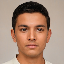 Neutral latino young-adult male with short  brown hair and brown eyes