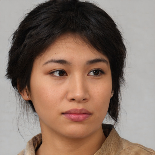 Neutral asian young-adult female with medium  brown hair and brown eyes