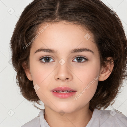 Joyful white child female with medium  brown hair and brown eyes