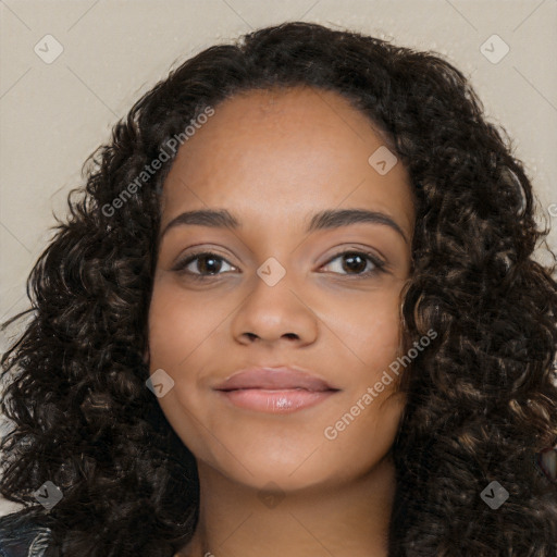 Joyful latino young-adult female with long  black hair and brown eyes