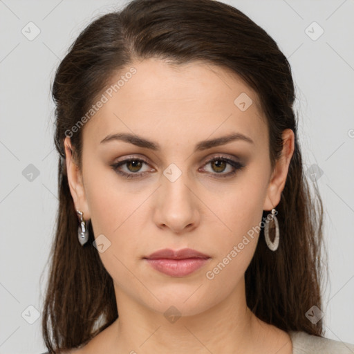 Neutral white young-adult female with long  brown hair and brown eyes