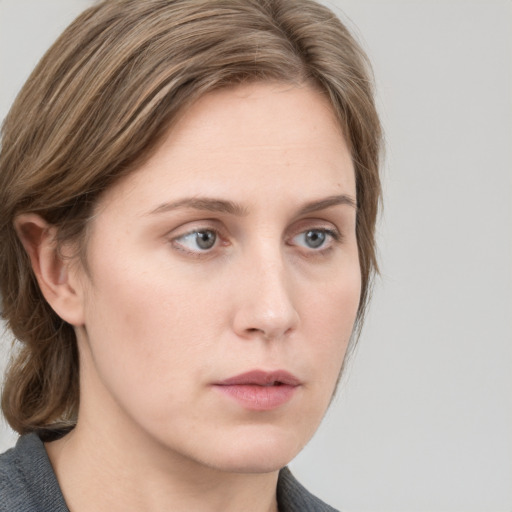 Neutral white young-adult female with medium  brown hair and grey eyes