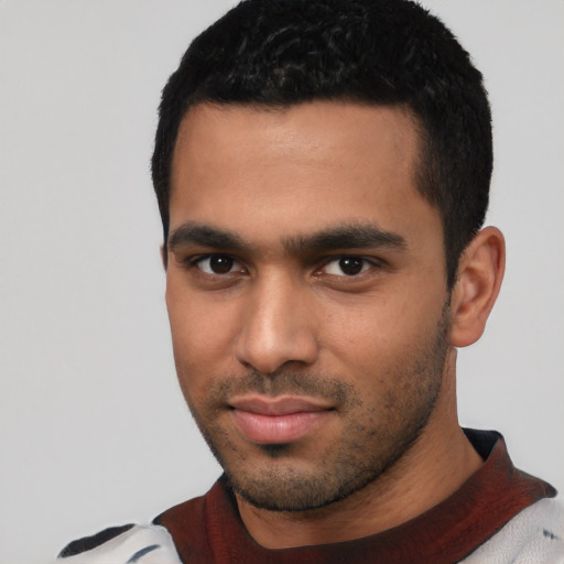 Neutral latino young-adult male with short  black hair and brown eyes