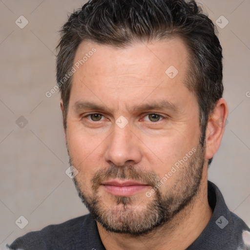 Neutral white adult male with short  brown hair and brown eyes