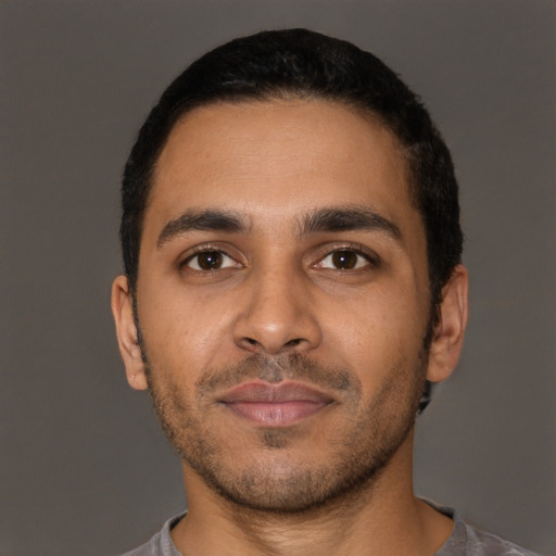 Neutral latino young-adult male with short  brown hair and brown eyes
