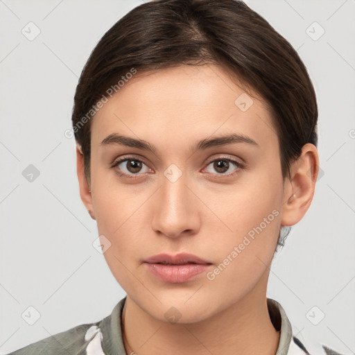 Neutral white young-adult female with short  brown hair and brown eyes