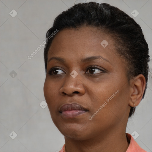 Neutral black young-adult female with short  brown hair and brown eyes