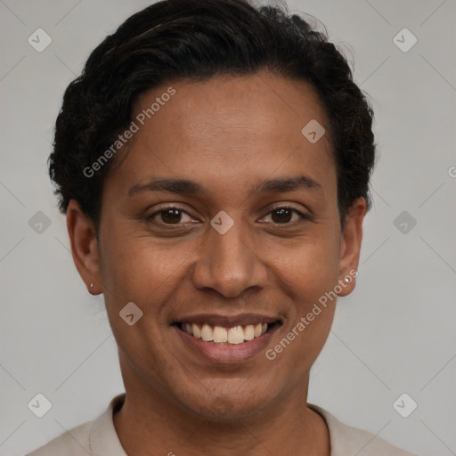 Joyful latino young-adult female with short  brown hair and brown eyes