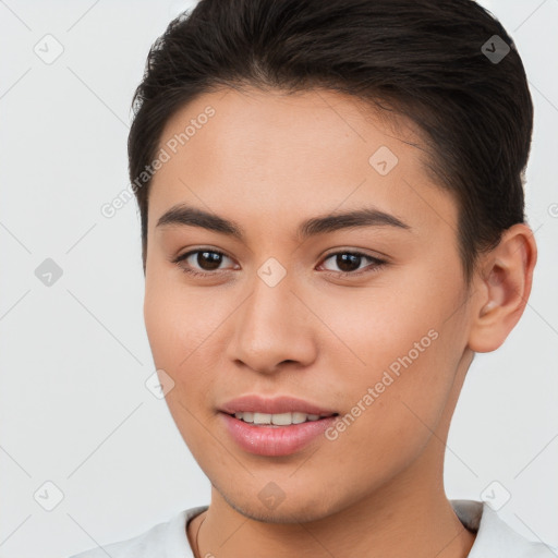 Joyful white young-adult female with short  brown hair and brown eyes