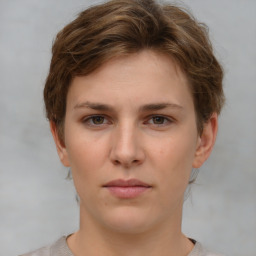 Neutral white young-adult female with short  brown hair and brown eyes