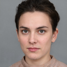 Neutral white young-adult female with short  brown hair and brown eyes