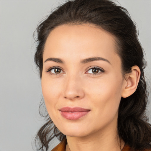 Joyful white young-adult female with medium  brown hair and brown eyes