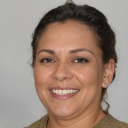 Joyful white adult female with short  brown hair and brown eyes