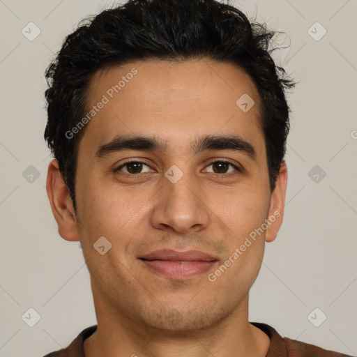 Joyful white young-adult male with short  black hair and brown eyes