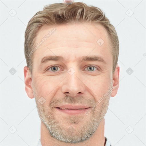 Joyful white adult male with short  brown hair and grey eyes