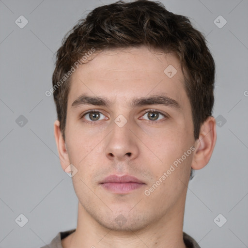 Neutral white young-adult male with short  brown hair and brown eyes