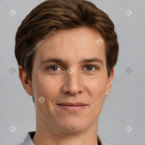 Joyful white adult male with short  brown hair and grey eyes