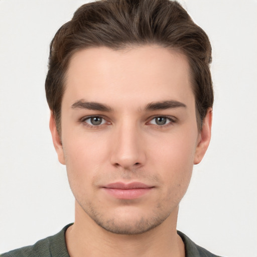 Neutral white young-adult male with short  brown hair and brown eyes