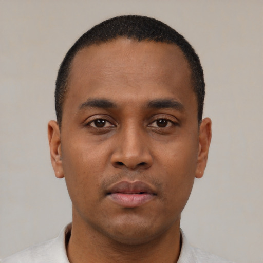 Neutral black young-adult male with short  black hair and brown eyes