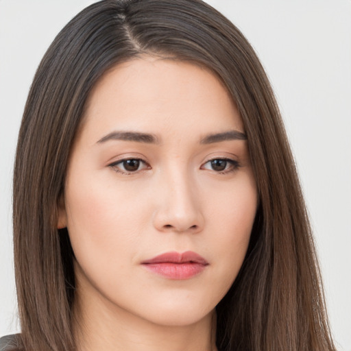 Neutral asian young-adult female with long  brown hair and brown eyes