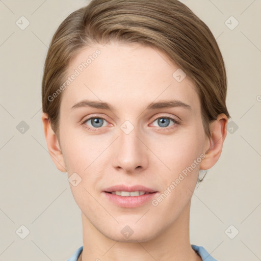 Joyful white young-adult female with short  brown hair and grey eyes