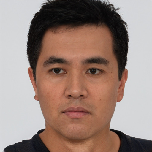 Neutral white young-adult male with short  black hair and brown eyes