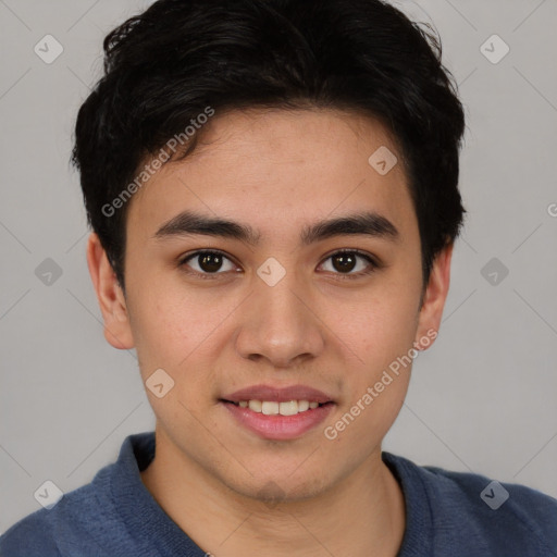 Joyful asian young-adult male with short  brown hair and brown eyes