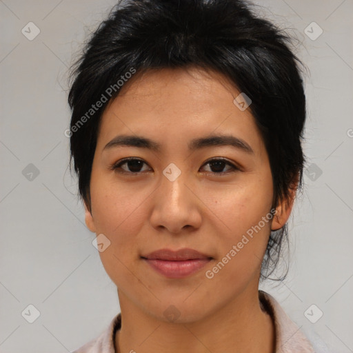 Joyful asian young-adult female with medium  black hair and brown eyes