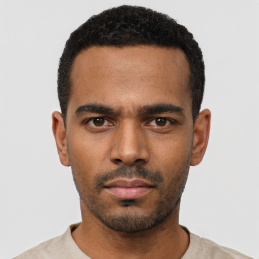 Neutral black young-adult male with short  black hair and brown eyes