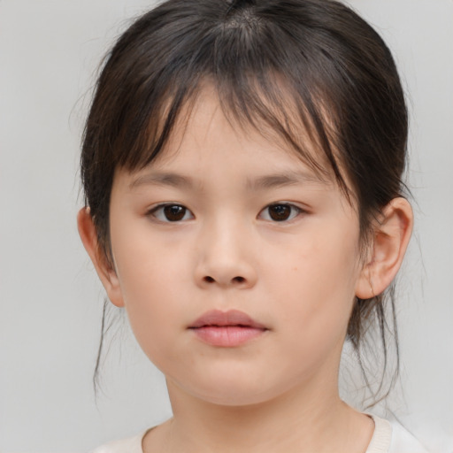 Neutral asian child female with medium  brown hair and brown eyes