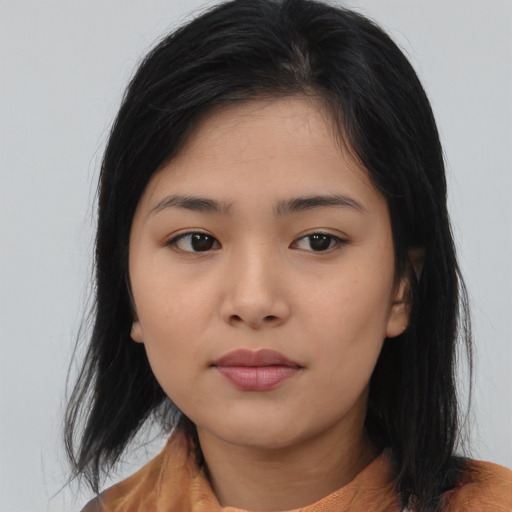 Neutral asian young-adult female with medium  black hair and brown eyes