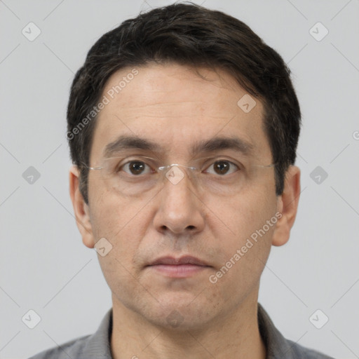 Neutral white adult male with short  black hair and brown eyes