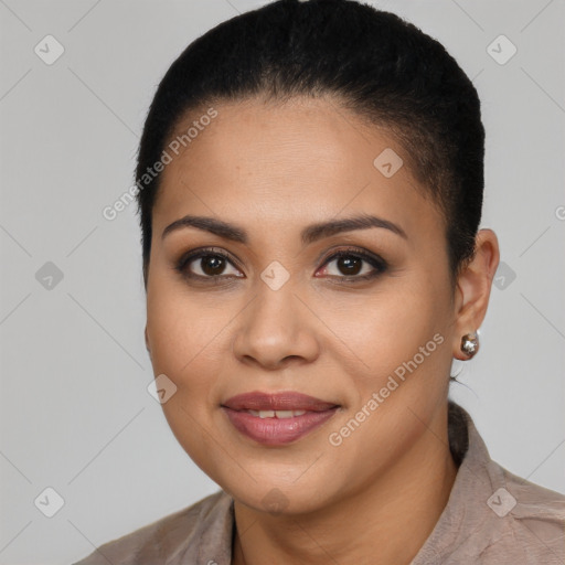 Joyful latino young-adult female with long  brown hair and brown eyes