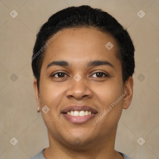 Joyful latino young-adult male with short  brown hair and brown eyes