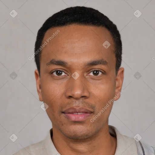 Neutral latino young-adult male with short  black hair and brown eyes