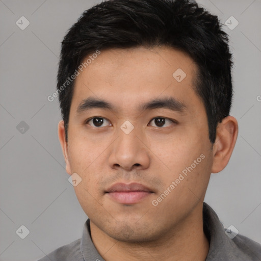 Neutral asian young-adult male with short  black hair and brown eyes