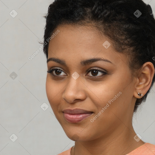 Joyful latino young-adult female with short  brown hair and brown eyes