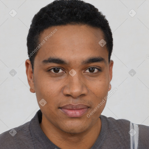 Joyful black young-adult male with short  black hair and brown eyes