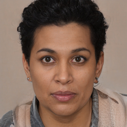 Neutral latino young-adult female with short  brown hair and brown eyes