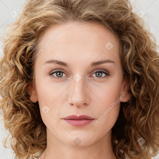 Neutral white young-adult female with long  brown hair and green eyes