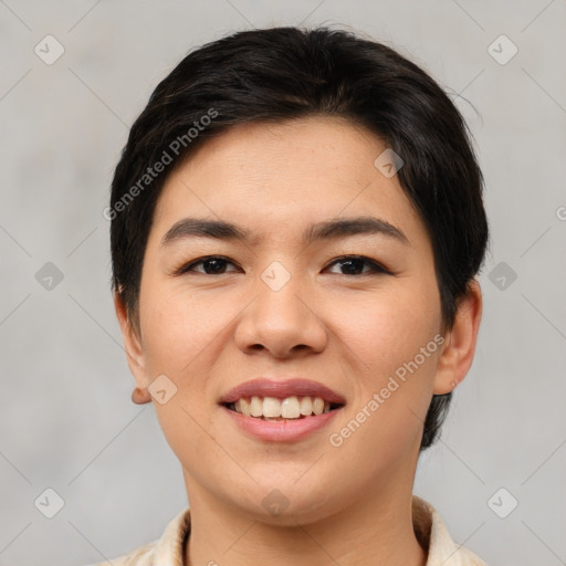 Joyful asian young-adult female with short  black hair and brown eyes