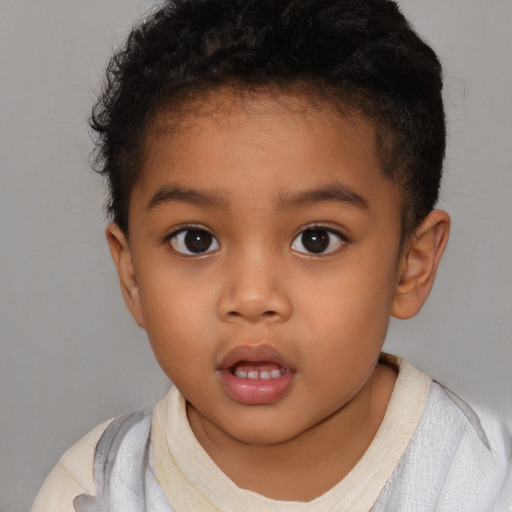 Neutral black child male with short  brown hair and brown eyes