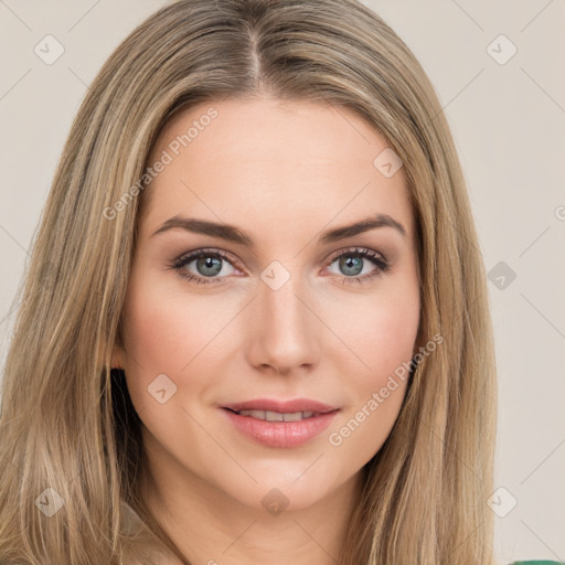 Joyful white young-adult female with long  brown hair and green eyes