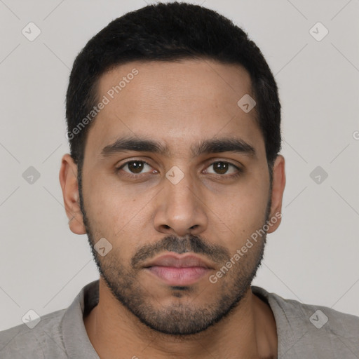 Neutral latino young-adult male with short  black hair and brown eyes