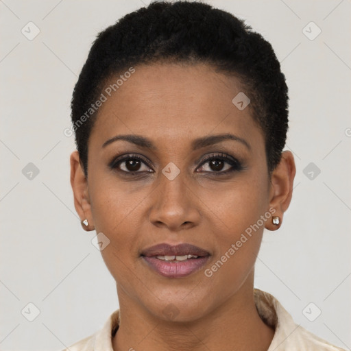 Joyful black young-adult female with short  black hair and brown eyes