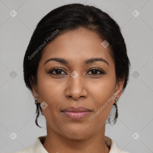 Joyful latino young-adult female with medium  brown hair and brown eyes