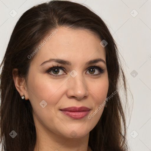 Joyful white young-adult female with long  brown hair and brown eyes