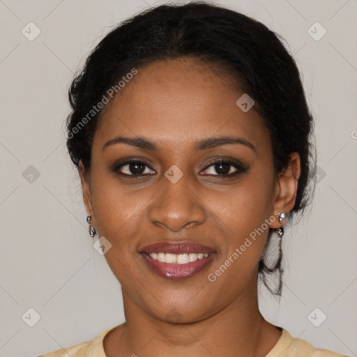 Joyful black young-adult female with long  brown hair and brown eyes